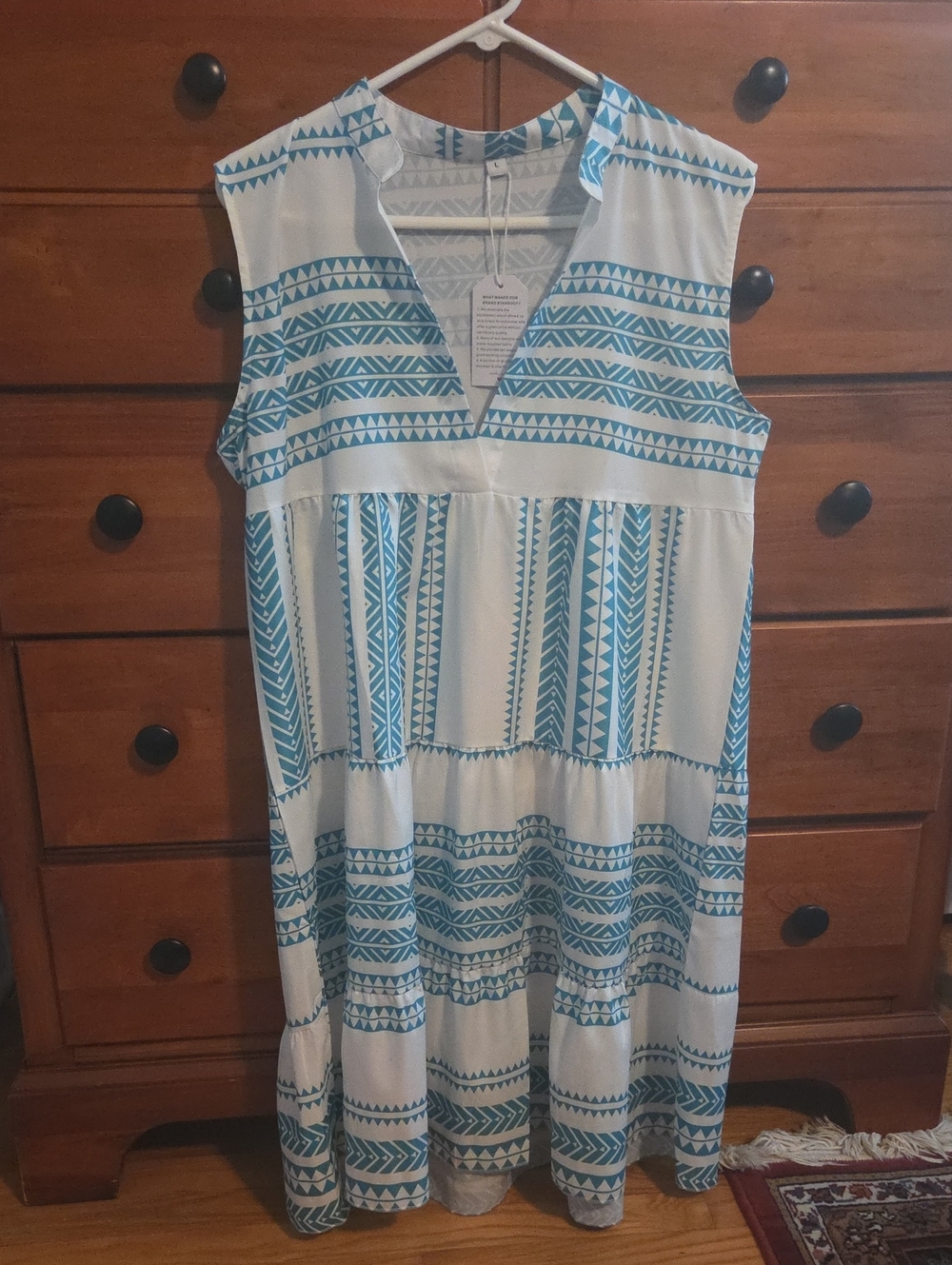 Sleeveless White Dress with Teal Geometric Print